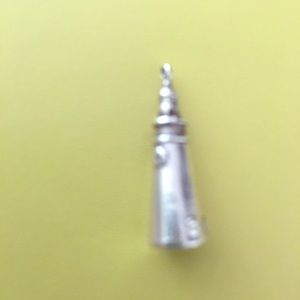 Sterling silver light house charm.
